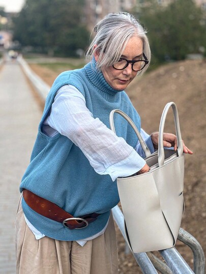 Livesso 女式无袖宽松高领针织背心