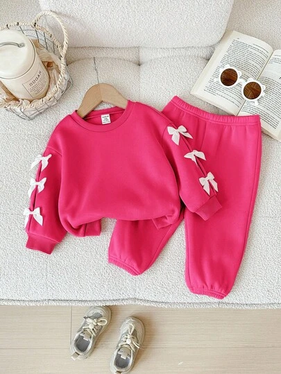 2 件女婴可爱紫红色蝴蝶结装饰长袖运动衫和松紧腰裤套装，秋冬