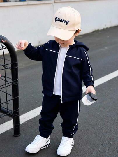 SHEIN Playful Pals 2 件套年轻男孩连帽卫衣和裤子套装，秋冬新款，黑色连帽衫搭配白色撞色条纹，黑色裤子，舒适休闲装，适合日常穿着，适合家庭/兄弟姐妹穿着