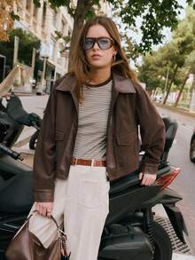 Nöista Cream Corduroy Wide-Leg Pants With High-Rise Fit, Front Patch Pockets, And A Straight Cropped Hem For A Relaxed Yet Polished Silhouette. Perfect For Fall And Winter Outfits - Pair With Knits, Blouses, Or Tailored Outerwear For Chic Everyday Style, City Strolls, Or Casual Gatherings.