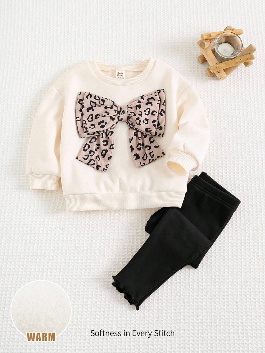 Cozy Pixies Set de 2 piezas: Sudadera de cuello redondo de manga larga con estampado de leopardo y lazo decorativo, y pantalones de cintura elástica de unicolor para niña. Conjunto de moda casual básica y versátil, cómodo para usar en interiores, exteriores, escuela, uso diario, deportes, fiestas, festivales, Halloween, Navidad y Año Nuevo en otoño/invierno. - Multicolor - Ver 1