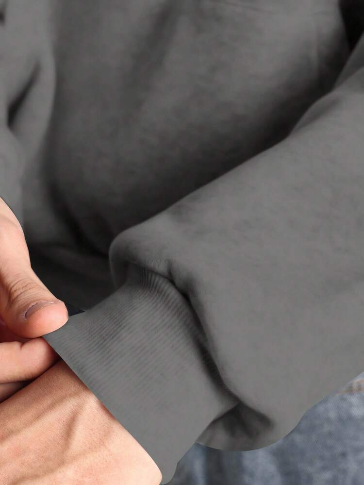 Oversized Graphic Print Hoodie With Front Pocket Design