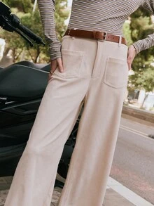 Nöista Cream Corduroy Wide-Leg Pants With High-Rise Fit, Front Patch Pockets, And A Straight Cropped Hem For A Relaxed Yet Polished Silhouette. Perfect For Fall And Winter Outfits - Pair With Knits, Blouses, Or Tailored Outerwear For Chic Everyday Style, City Strolls, Or Casual Gatherings.