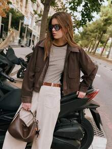 Nöista Cream Corduroy Wide-Leg Pants With High-Rise Fit, Front Patch Pockets, And A Straight Cropped Hem For A Relaxed Yet Polished Silhouette. Perfect For Fall And Winter Outfits - Pair With Knits, Blouses, Or Tailored Outerwear For Chic Everyday Style, City Strolls, Or Casual Gatherings.