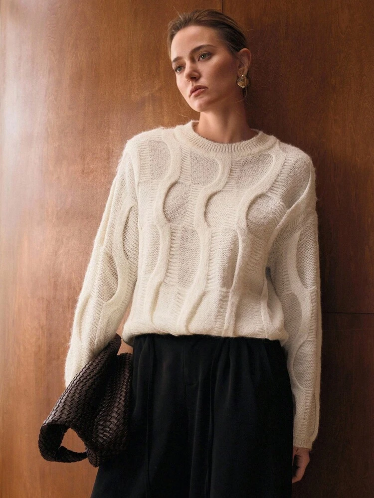 Maglione oversize in maglia lavorata a trama solida con spalle a caduta