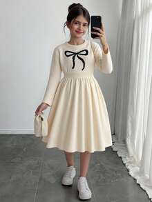 SHEIN Đầm len midi tay dài cổ tròn, thoải mái, tối giản, trang trí nơ cho bé gái tuổi mới lớn, mùa thu/đông - Màu be - Xem 1