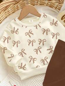 SHEIN 2 件套年轻女孩奶油黄和咖啡棕色可爱迷你豹纹蝴蝶结图案圆领长袖运动衫和紧身裤，秋冬装，轻松舒适，秋季多层穿着，时尚休闲装，儿童图案服装，返校，秋季服装，返校节