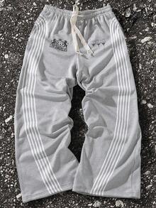 Manfinity EMRG Quần nỉ ống rộng lưng cao họa tiết sọc chữ cho nam - Xám - Xem 1