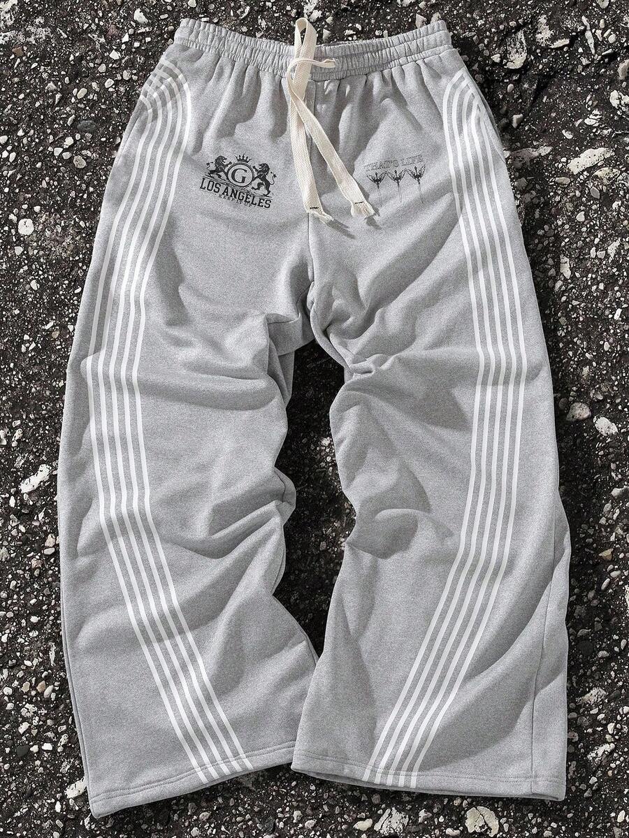 Manfinity EMRG Quần nỉ ống rộng lưng cao họa tiết sọc chữ cho nam - Xám - Xem 1