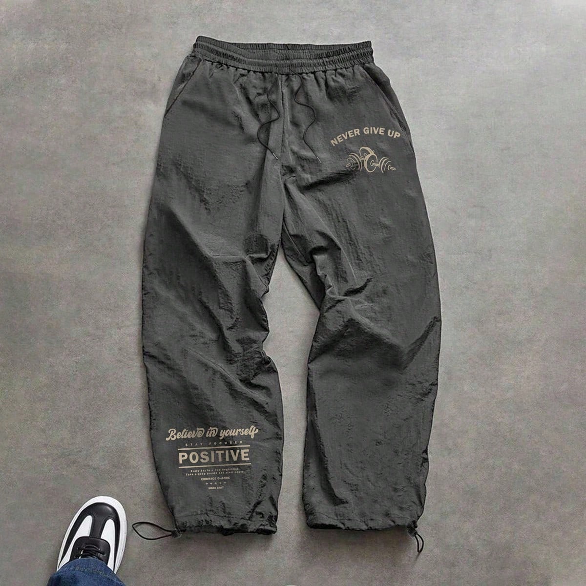 Pantalones deportivos casuales holgados para hombre con estampado de letras, cintura con cordón, para entrenamiento y running, transpirables, ligeros