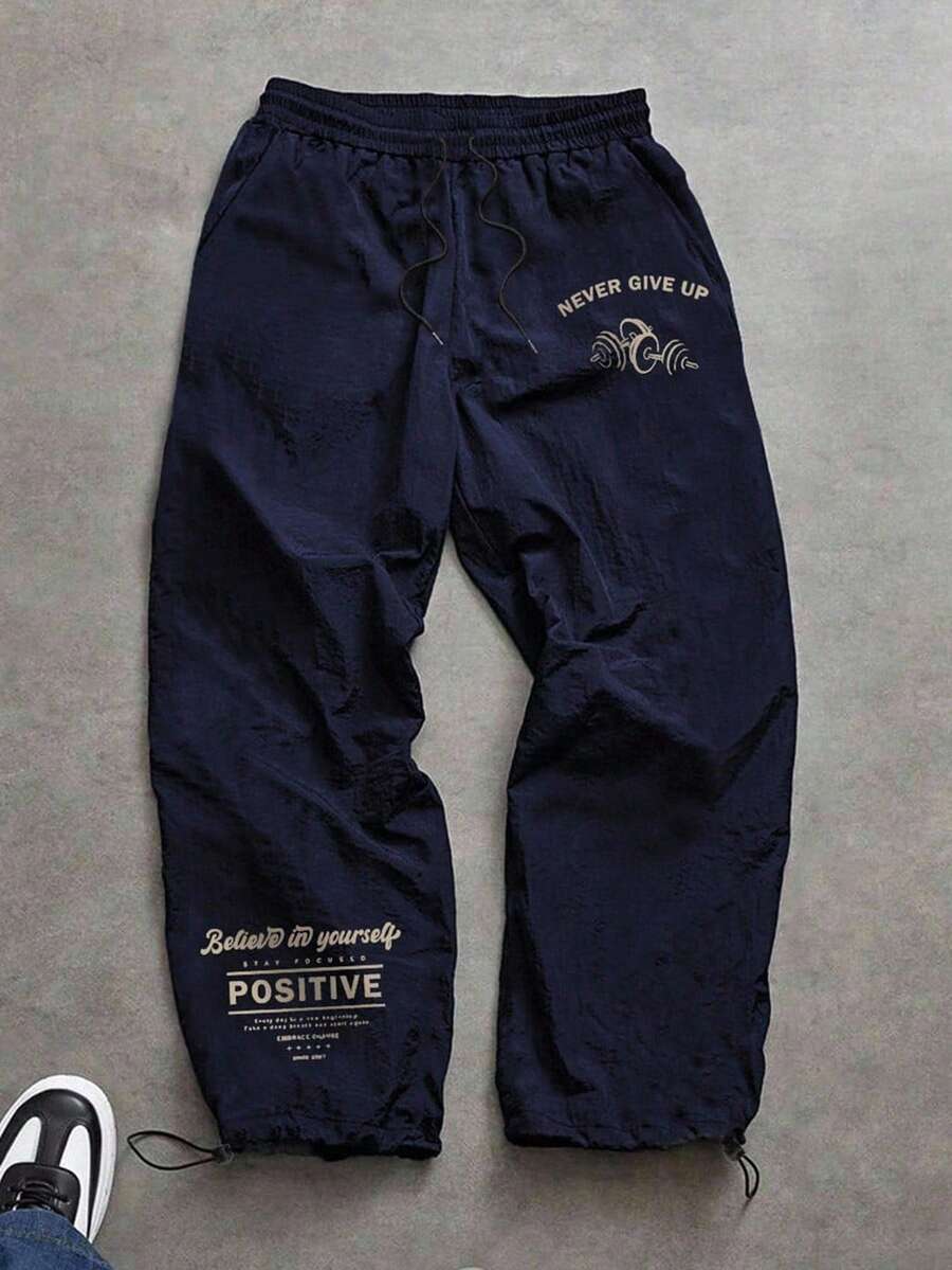 Sport MetroGents Pantalones jogger con cordón en la cintura y estampado de letras para hombres, transpirables y cómodos para el otoño - azul real - Ver 1