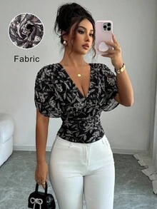 Elenzga Women's Cross-Wrap Short Sleeve Fitted Allover Print Shirt - Black - View 1