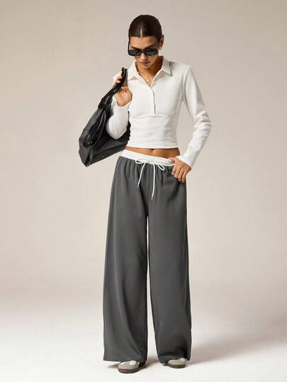 Hanevo Pantalones casuales sueltos con cintura elástica y cordón de bloqueo de color para mujer