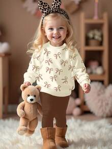 SHEIN 2 件套年轻女孩奶油黄和咖啡棕色可爱迷你豹纹蝴蝶结图案圆领长袖运动衫和紧身裤，秋冬装，轻松舒适，秋季多层穿着，时尚休闲装，儿童图案服装，返校，秋季服装，返校节