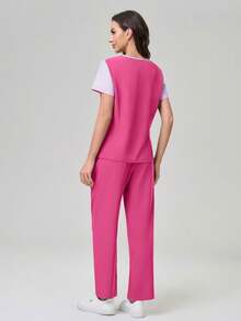 TaskEZ Conjunto de uniforme de scrubs con top de manga corta en degradado y pantalones de unicolor - Rosa - Ver 6
