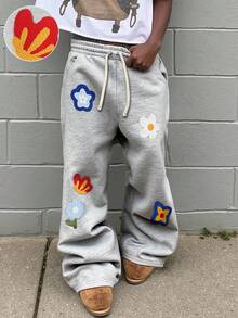 Manfinity EMRG Men's Floral Embroidery Drawstring Waist Flare Sweatpants Flower Sweatpants Patched Sweatpants Graphic Sweatpants Summer Sweatpants