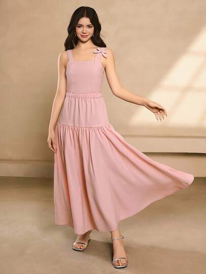 Conjunto elegante y minimalista de top corto sin mangas de cuello cuadrado con acento de lazo y falda larga de unicolor, adecuado para volver a la escuela, invitado de boda, Navidad, fiesta de Halloween, baile de graduación