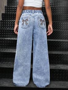 Jeans vintage années 90 pour préadolescentes, imprimé léopard, poches larges, taille basse, denim polyvalent à jambes évasées, style Y2K. Tenues pour enseignantes, tenues de rentrée scolaire, robes d'église, tenues casual chic pour filles, robes en jean cargo, pantalons larges d'automne/hiver pour filles. Jeans en denim à jambes longues et évasées avec imprimé léopard pour adolescentes. Jeans en denim à jambes évasées et imprimé léopard marron pour le style streetwear des adolescentes - Jean clair - Voir 2