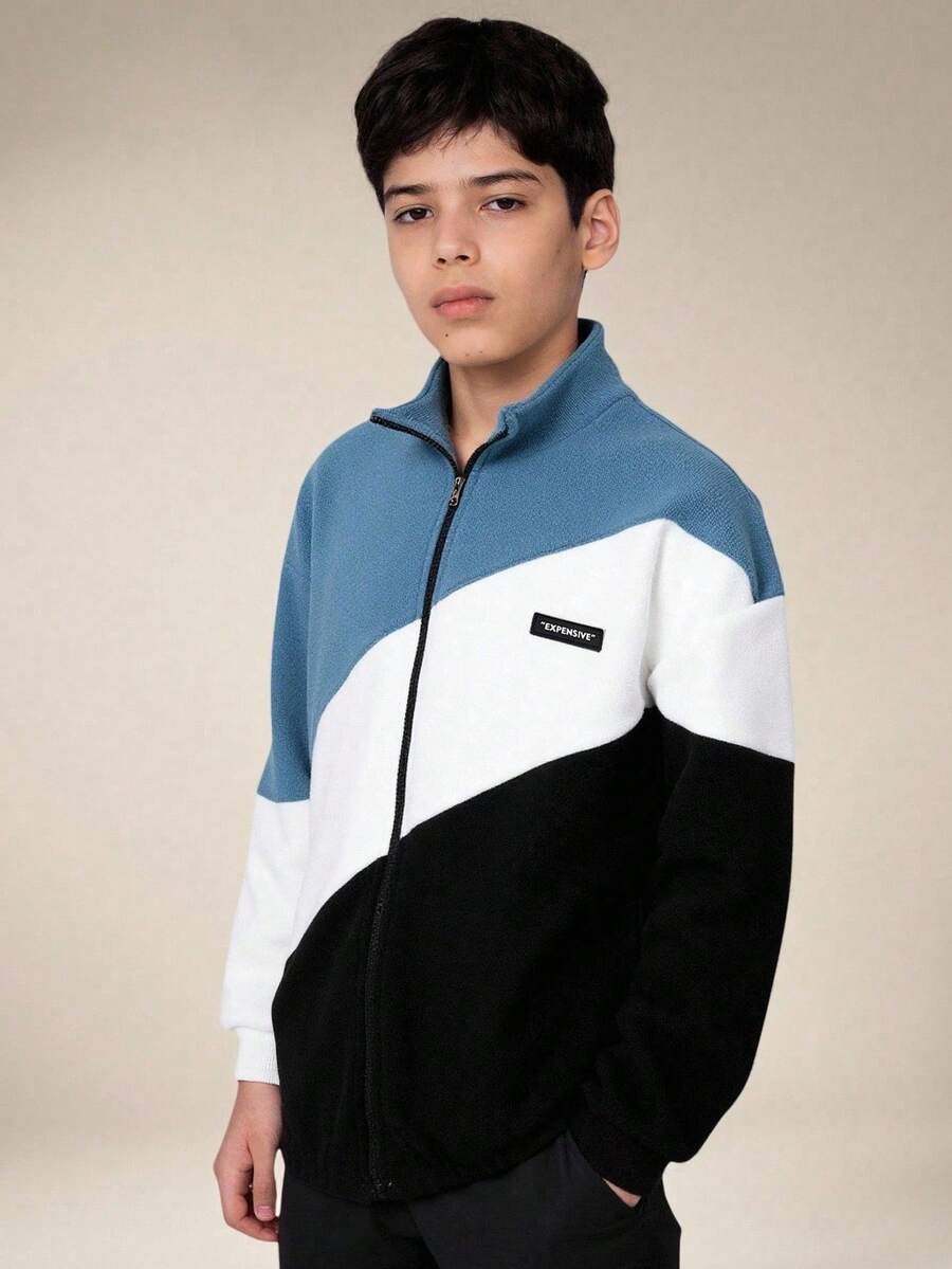 SHEIN Explorewe Chaqueta de otoño/invierno para niños, chaqueta de una sola pieza de estilo de moda con parches de piel sintética de manga larga, diseño de contraste de color que muestra un estilo personalizado, con cuello alto y cremallera. Diseño de cuello alto con cremallera, parches de color azul, blanco y negro de felpa sherpa que resalta la mirada, adecuado para usar en la calle, el campus y en exteriores de otoño/invierno para niños. - Azul - Ver 1
