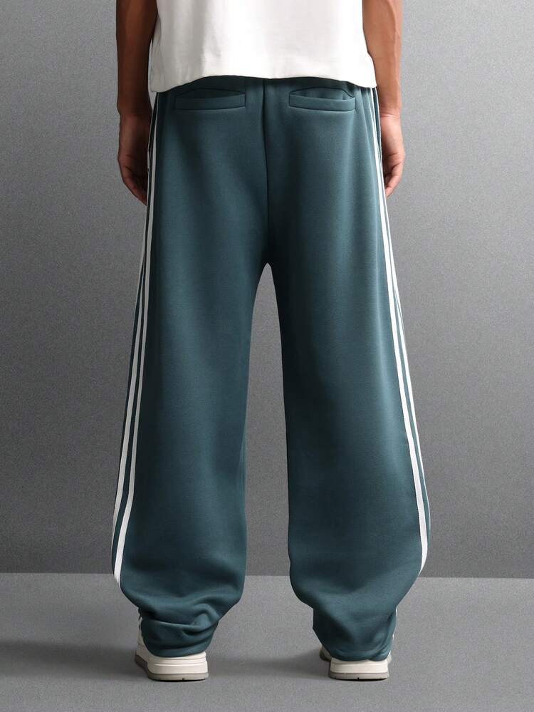 Drop Crotch Sweatpants With Side Stripes And Elastic Cuffs