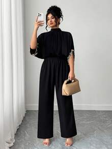 Elenzga 加大码女式优雅短袖连体裤，立领，后系带，刺绣袖口，适合休闲和派对穿着 - 黑色 - 查看 4