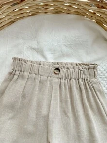 嬰兒女孩分層擺設拼接荷葉邊綁肩背心及紙袋腰短褲