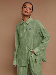 COSMINA Camisa casual de manga larga con botones delanteros de unicolor y corte holgado para mujer