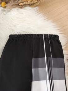 SHEIN مجموعة بلوزة وبنطلون رياضي بأكمام طويلة وياقة مستديرة للأطفال والرضع الصبية بتصميم مريح وطباعة شريطية كلاسيكية، مناسبة للخريف والشتاء، قطعتان