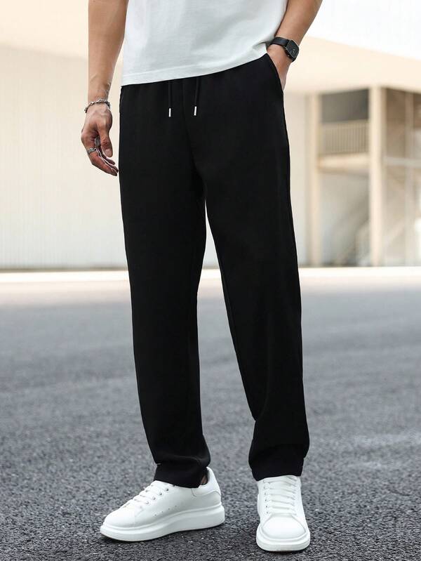 Manfinity EZcore بنطلون رجالي بخصر مربوط بسحاب وجيوب، لون أحادي، فضفاض وكاجوال، خريف