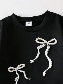 Sparklyn Young Girls Black Ribbon Bow Crew Neck Sweatshirt With Delicate Pearl Detail, Straight Leg Pocket Pants Set Fall Winter - Black - View 3