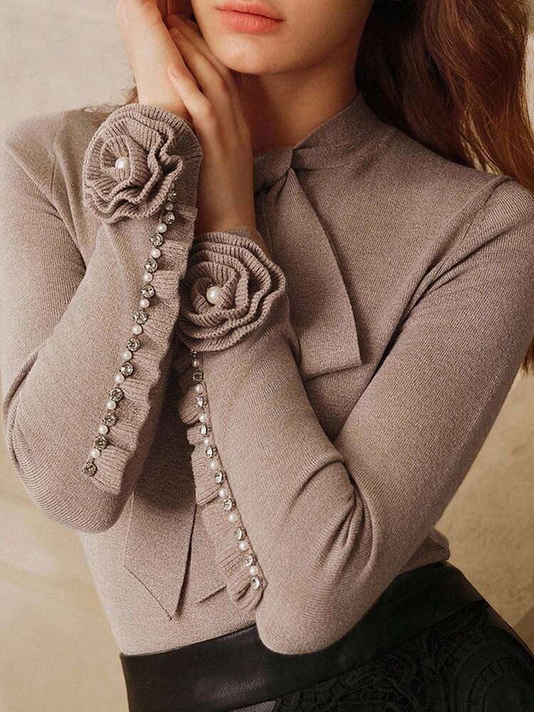 Anewsta Savoree Pull de Noël pour femmes, décoration de nœud papillon Top de gamme, fleur 3D ornée de strass, manches longues, hiver