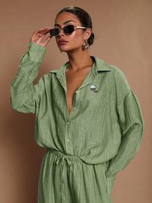 COSMINA Camisa casual de manga larga con botones delanteros de unicolor y corte holgado para mujer