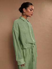 COSMINA Camisa casual de manga larga con botones delanteros de unicolor y corte holgado para mujer