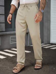 Manfinity Homme Pantalon décontracté à poche nouée de couleur unie pour hommes, polyvalent pour le port quotidien. Pantalon de jogging crème pour hommes, pour l'automne - Kaki - Voir 6