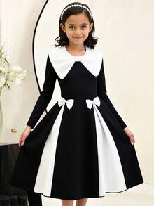 SHEIN Explorewe Vestito di moda per ragazze pre-adolescenti con collo rotondo, maniche lunghe, fiocco decorativo e orlo arricciato con effetto colorblock - nero - Visualizzare 1