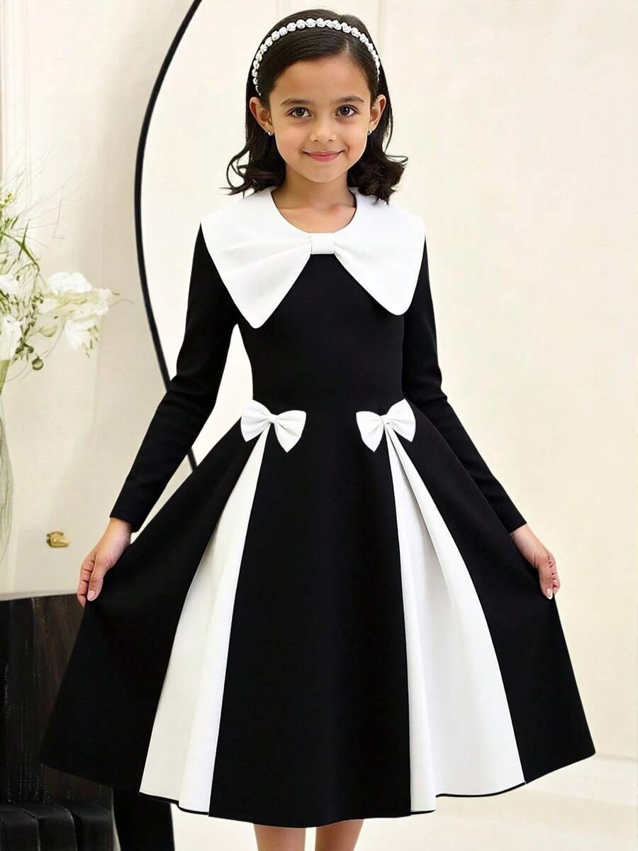 SHEIN Explorewe Vestito di moda per ragazze pre-adolescenti con collo rotondo, maniche lunghe, fiocco decorativo e orlo arricciato con effetto colorblock - nero - Visualizzare 1