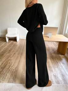 CovetEZ Women's Black Knitwear Sweater Co-Ord With Asymmetrical Neck Long Drop Shoulder Sleeves And Regular Length Plain Rib-Knit Pants Casual Loungewear Set Black 2 Piece Set Black Pants Suit Women Two Piece Set Women Comfy Two Piece Lounge Set Comfortable Two Piece Set,Fall,Fall Clothes For Women - Black - View 2