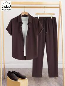 Manfinity Homme Traje casual de talla grande para hombre con camisa de manga corta de un solo pecho y pantalones de unicolor