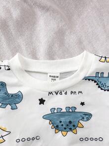 SHEIN Playful Pals 2pcs Baby Boy Dinosaur Print Round Neck Long Sleeve Top And Solid Green Pants Set, Suitable For Outdoor Play, Casual And Sports Wear, Spring/Autumn Baby Boy Winter Set Baby Boy Dinosaur Set Baby Boy Casual Set Fall