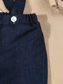 SHEIN 4pcs Formal Gentleman Outfit For Baby Boy, Including White Long Sleeve Shirt, Bowknot, Single-Breasted Vest, Elastic Waist Suspender Pants, And Hat. Vintage Gentleman Style Suitable For Holidays, Formal Occasions, Weddings, Performances, Parties, Birthdays, Back To School, Christmas, And Graduations. Fall Winter