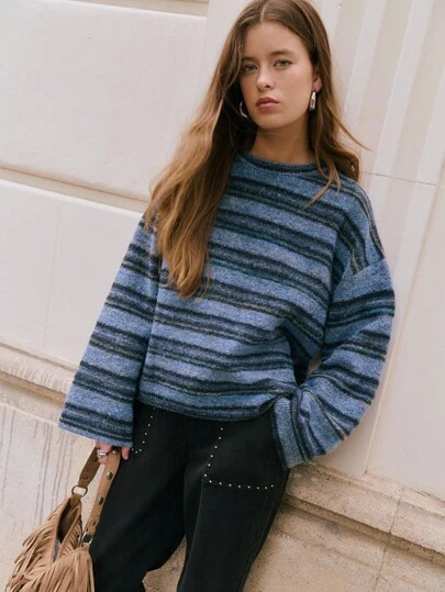 Nöista Crew-Neck Striped Sweater With A Relaxed Fit, Offering A Casual Yet Elegant Option For Women's Winter Outfits; Perfect For Polished Everyday Styling, Cozy Seasonal Looks, Festive Christmas Dressing And Modern New Year Ensembles.