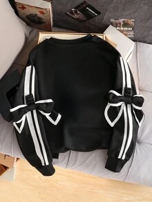 SHEIN 1件少女宽松圆领套头卫衣，长袖，宽松版型，袖口饰有可拆卸蝴蝶结，适合秋冬季休闲穿着 - 黑色 - 查看 2