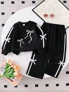 Sparklyn Young Girls Black Ribbon Bow Crew Neck Sweatshirt With Delicate Pearl Detail, Straight Leg Pocket Pants Set Fall Winter - Black - View 1