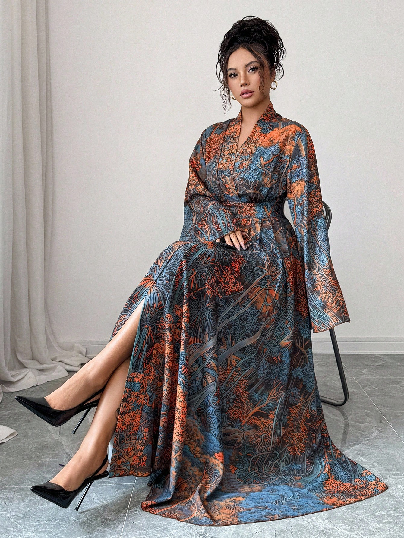 Elenzga long dress fully printed with wide ruffled sleeves, ruffled tail, and a crossover wrap design for women