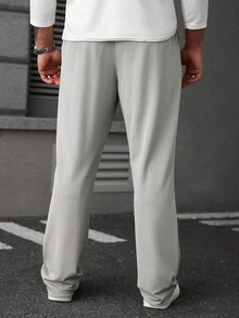 Manfinity CasualCool Pantaloni casual alla moda da uomo con tasche toppe e coulisse, pantaloni essenziali, pantaloni della tuta color grigio chiaro, Old Money, autunno - Grigio Chiaro - Visualizzare 2