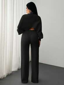 EURMUSE 2 Pieces Ribbed Knit Lounge Set Featuring Asymmetrical Sweater With Decorative Bow Accents And Matching High-Waisted Pants - Black - View 3