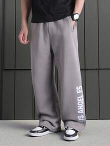 SHEIN Lose geschnittene, gerade geschnittene graue Hosen mit Blume Muster für Teenager-Jungen, lässiger Schul- und College-Stil, bequeme Mode, vielseitiger, weicher Stoff, geeignet für den täglichen Gebrauch, Schule, Reisen, Outdoor-Sport, Frühling/Sommer - Grau - Übersicht 4