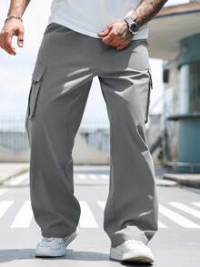 Manfinity Homme Pantalones casuales sueltos con bolsillo de unicolor para hombres talla grande, otoño - Gris Oscuro - Ver 1
