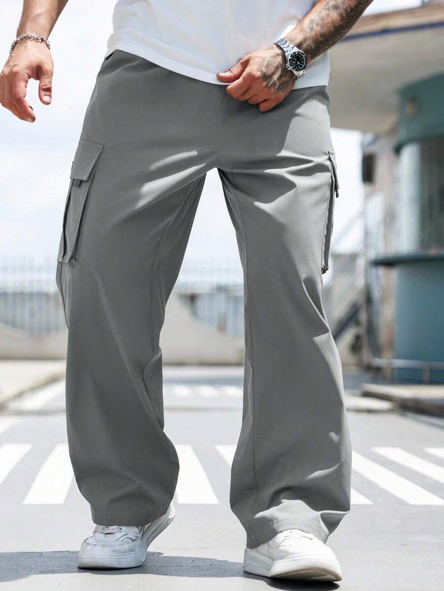 Manfinity Homme Pantalones casuales sueltos con bolsillo de unicolor para hombres talla grande, otoño - Gris Oscuro - Ver 1