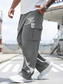 Manfinity Homme Pantalones casuales sueltos con bolsillo de unicolor para hombres talla grande, otoño - Gris Oscuro - Ver 4